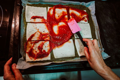 High angle view of person preparing food