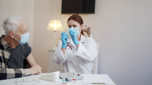 Female doctor working at clinic