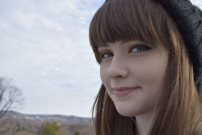 Close-up portrait of teenager with lip piercing