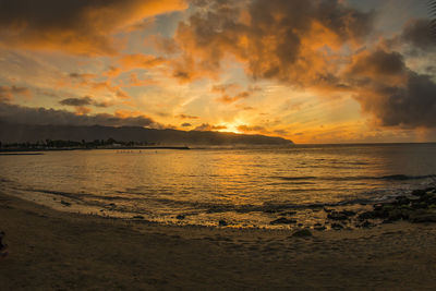 Scenic view of sea against sky during sunset