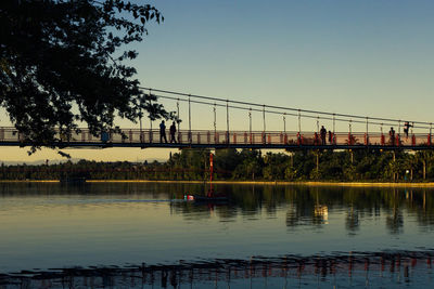 Bridge over river against clear sky