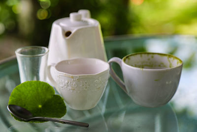 Close-up of tea cup on table