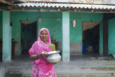 Portrait of smiling indian woman wearing sari