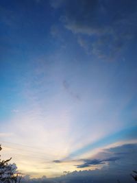 Low angle view of cloudy sky during sunset