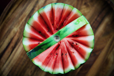 Directly above shot of red fruit on wood