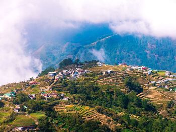 Aerial view of townscape against sky