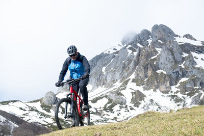 Cyclist man riding mountain bike