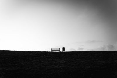 House on field against sky