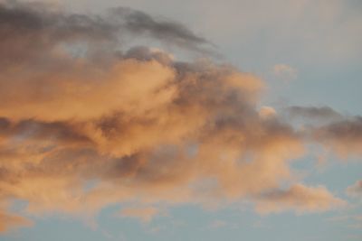 Low angle view of cloudy sky during sunset