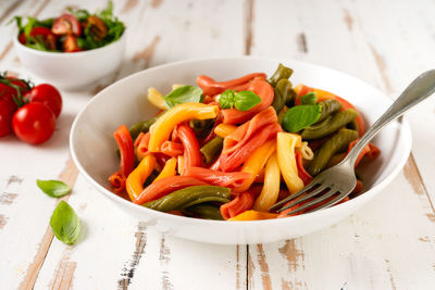 High angle view of salad in bowl on table