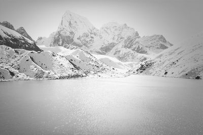 Scenic view of snow covered mountains