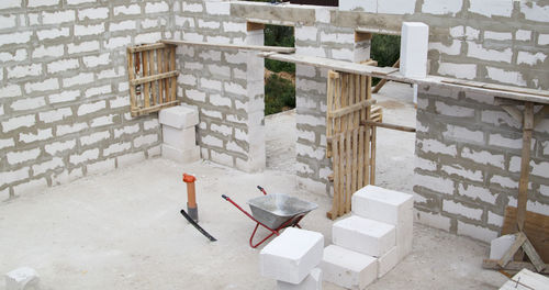 High angle view of chairs on table