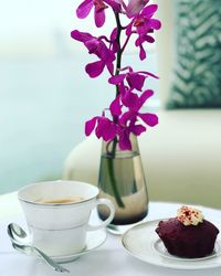 Close-up of cappuccino served on table