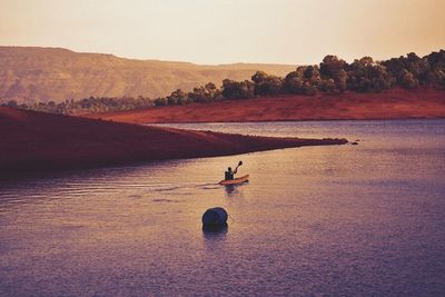 Scenic view of landscape at sunset