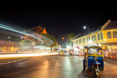 Light trails on city street at night