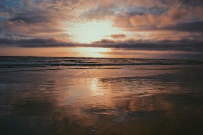 Scenic view of sea against dramatic sky