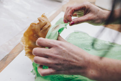 Wax and silicone casting revealing lips in artist studio