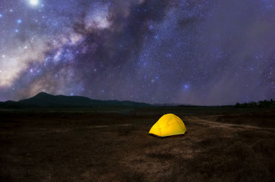 Tent against sky at night