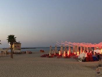 Scenic view of beach against clear sky