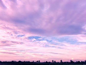 Low angle view of dramatic sky during sunset