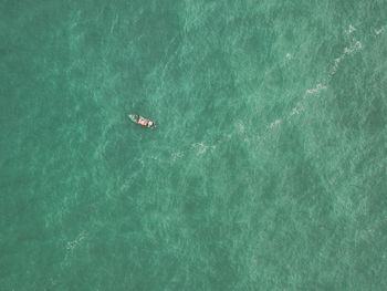 Top view of a lonely boat in the ocean 