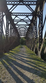 Full frame shot of bridge on field against sky