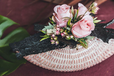 High angle view of pink flowering plant on table