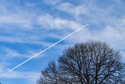 Low angle view of vapor trail in sky