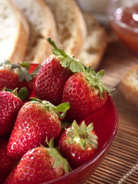 Close-up of strawberries in bowl on table