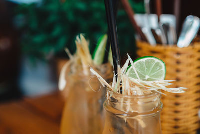 Close-up of drink in glass jar on table