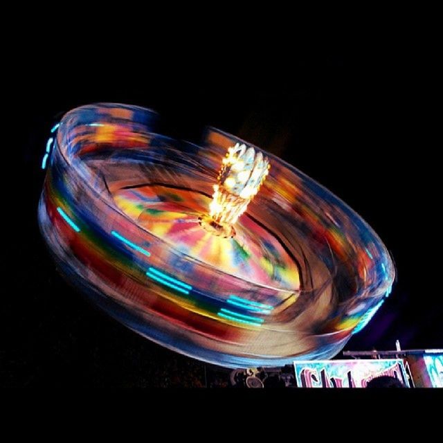 night, illuminated, long exposure, light trail, motion, multi colored, blurred motion, glowing, speed, arts culture and entertainment, light - natural phenomenon, light painting, copy space, spinning, fire - natural phenomenon, outdoors, no people, dark, lighting equipment, low angle view