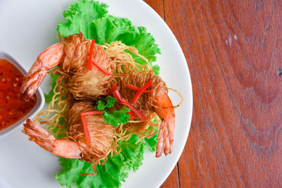 High angle view of salad in bowl on table