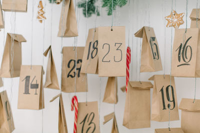 Close-up of paper lanterns hanging on wall