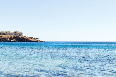 Scenic view of sea against clear sky