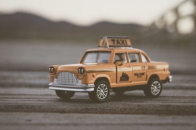 Close-up of toy car on road