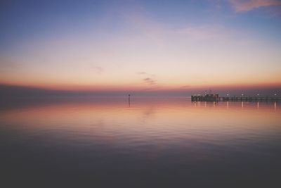 Scenic view of sea at sunset