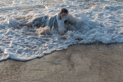 Waves splashing on shore