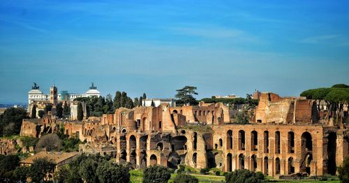 Old building in city against sky