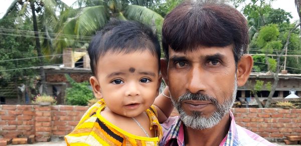 Indian kid with his grand father