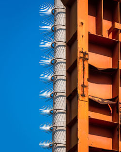 Low angle view of building against blue sky