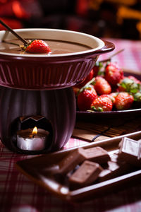 Close-up of fruits in bowl on table