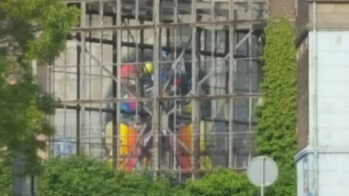 Close-up of building seen through window