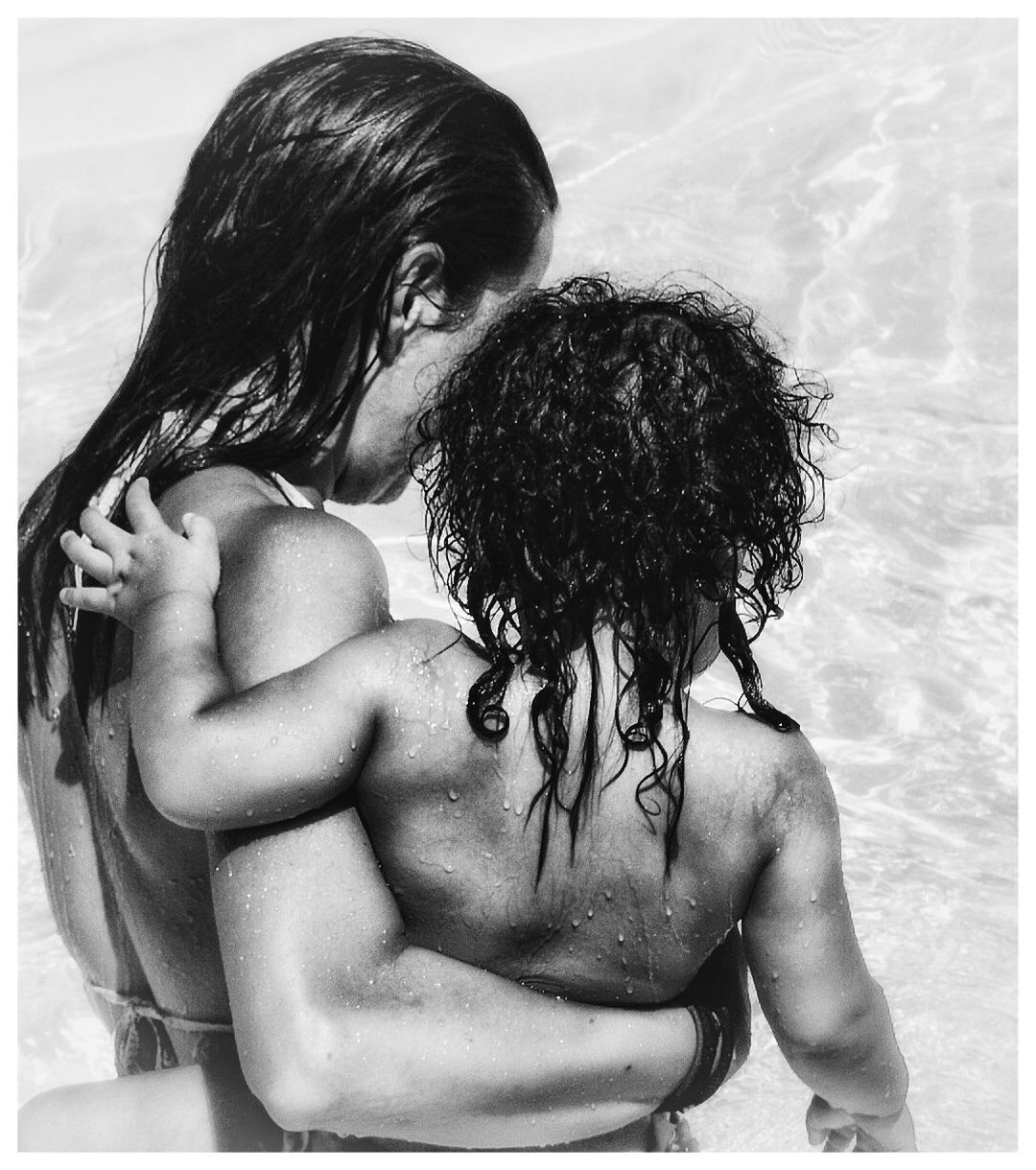 black and white, women, monochrome photography, adult, two people, rear view, togetherness, drawing, person, hairstyle, love, female, emotion, sketch, positive emotion, kissing, men, long hair, young adult, lifestyles, monochrome, auto post production filter, child, transfer print, waist up, nature, bonding, water, embracing, leisure activity, romance, childhood, portrait, back, photo shoot