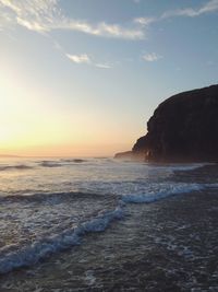 Scenic view of sea at sunset