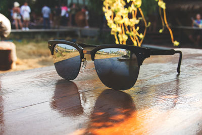 Close-up of sunglasses on table