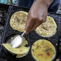 Close-up of man preparing food