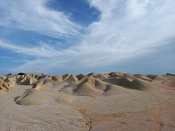 Scenic view of desert against sky