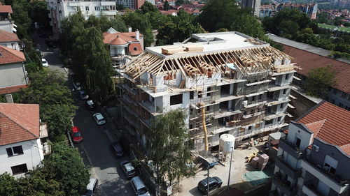 High angle view of street and houses in town