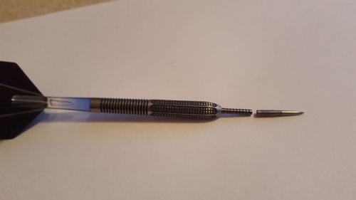 Close-up of pen on table