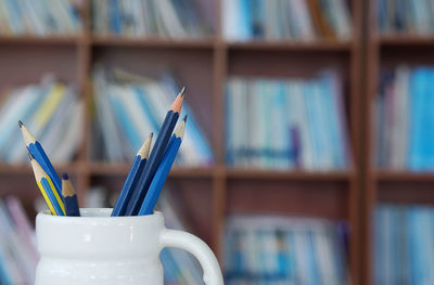 Close-up of pencils in desk organizer